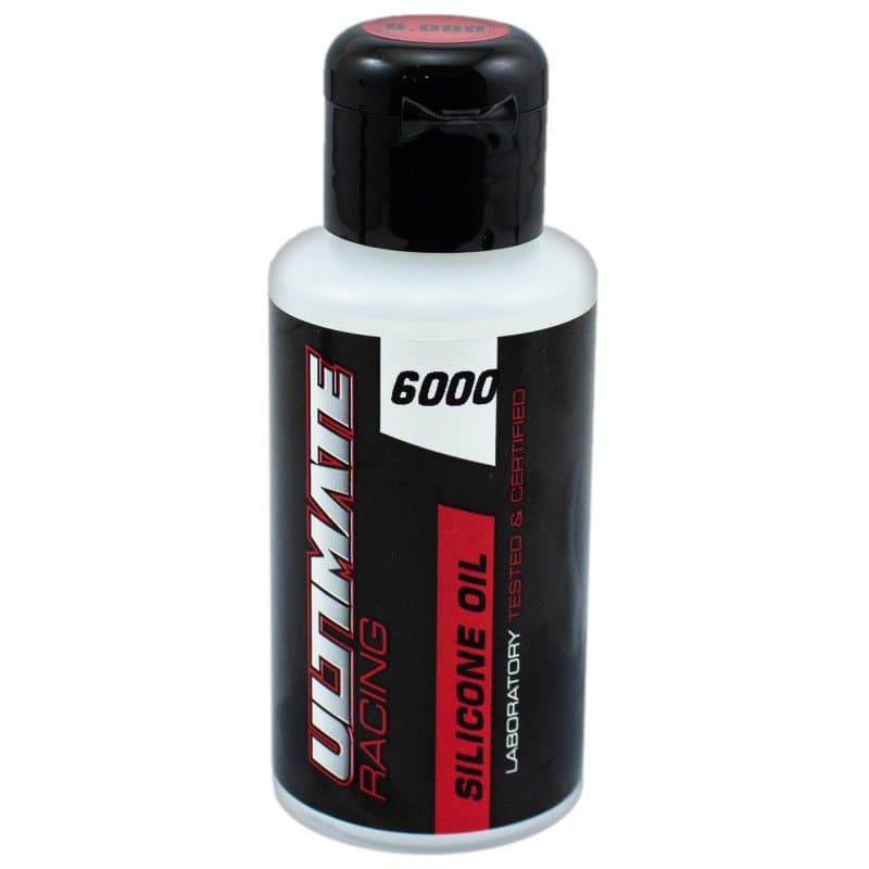 Ultimate Racing silikonolje 6000 i hvit flaske